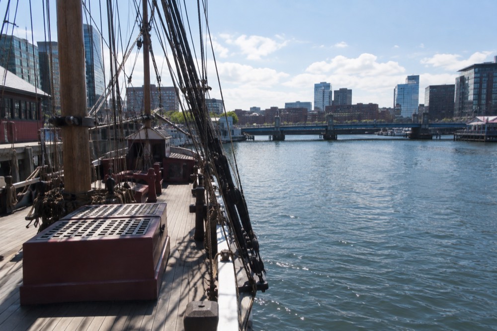 Replica eighteenth-century sailing ship docked at a Boston museum wharf