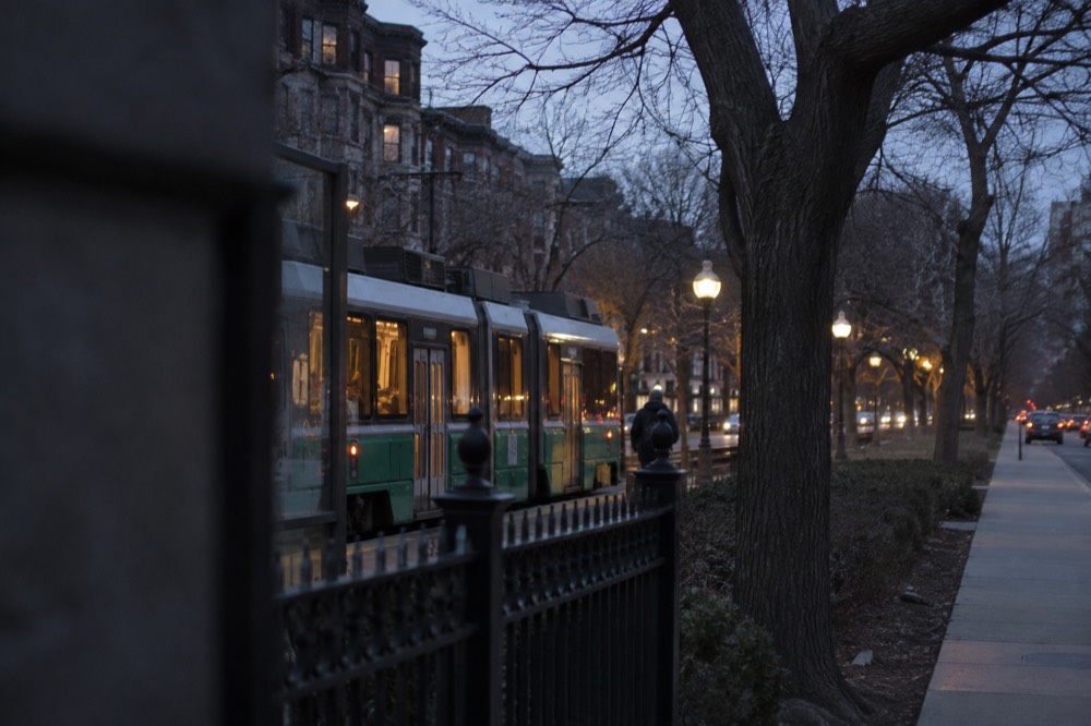 A Green Line trolley stopped on the Commonwealth Avenue median