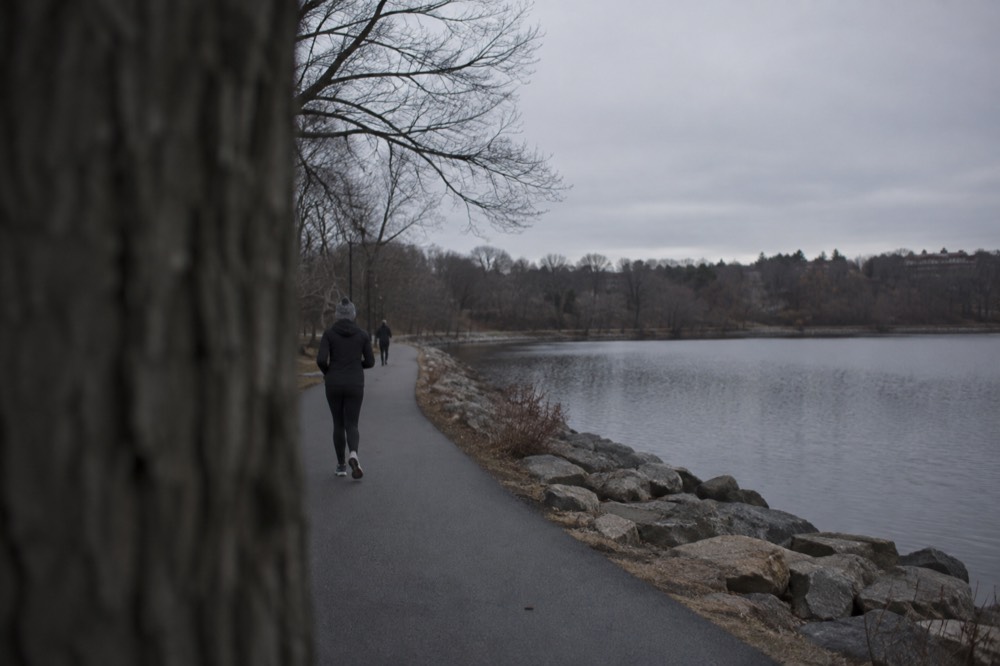 A paved path looping around the Chestnut Hill Reservoir