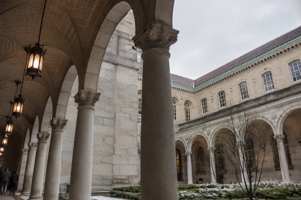 Sunlight on the courtyard arcade of the Boston Public Library McKim Building