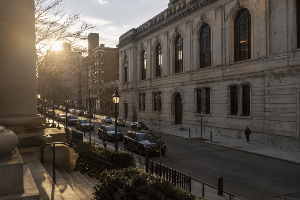 The Boston Athenaeum building on Beacon Street with its stone facade and arched windows