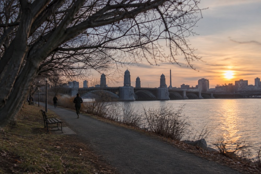 The Longfellow Bridge and river path seen from the Esplanade at golden hour
