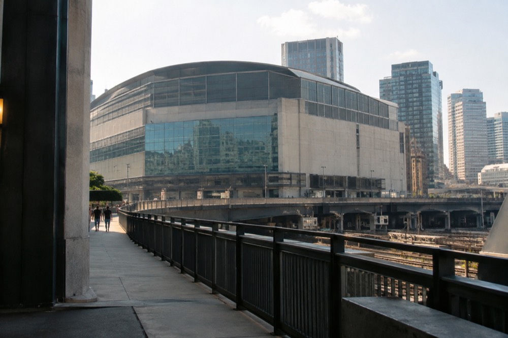 The exterior of TD Garden arena above North Station in Boston on a bright day