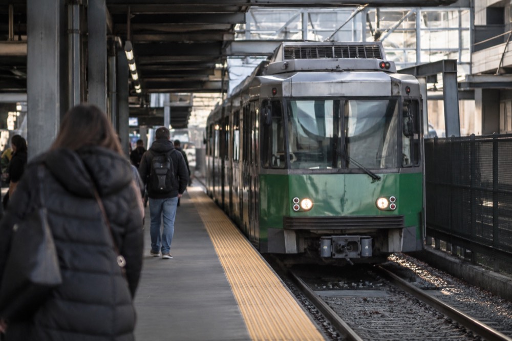 Green Line trolley arriving at North Station station platform in Boston
