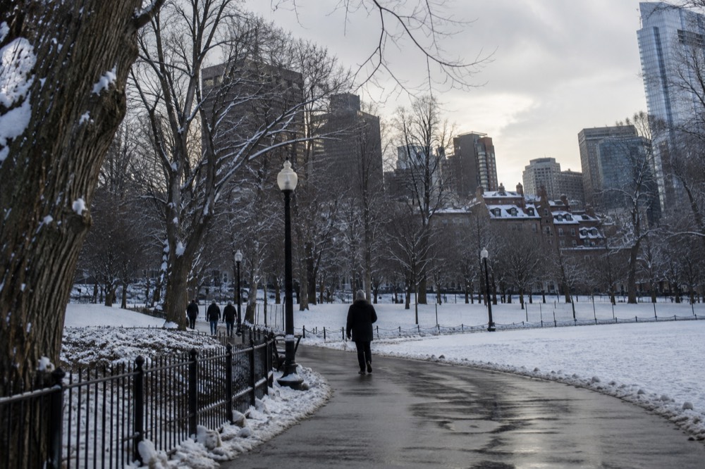 Snow dusting the brownstones of a Boston residential street in December