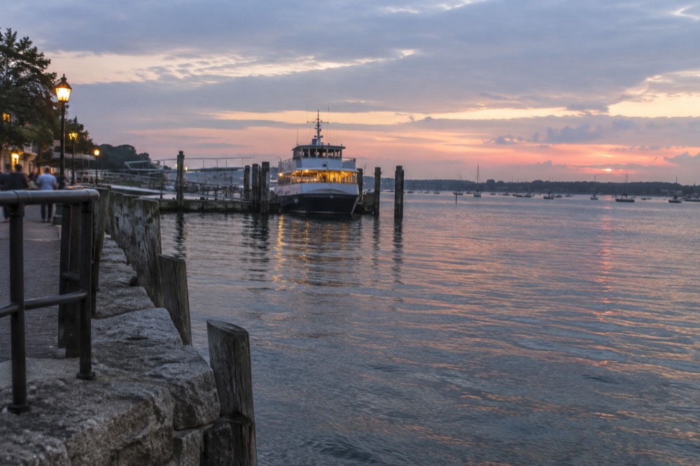 The Salem waterfront at twilight with a ferry docked