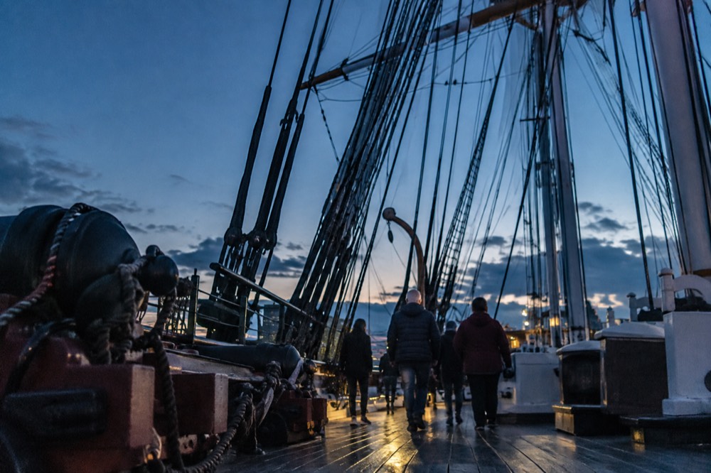 Visitors walking the deck of the USS Constitution in Charlestown Navy Yard