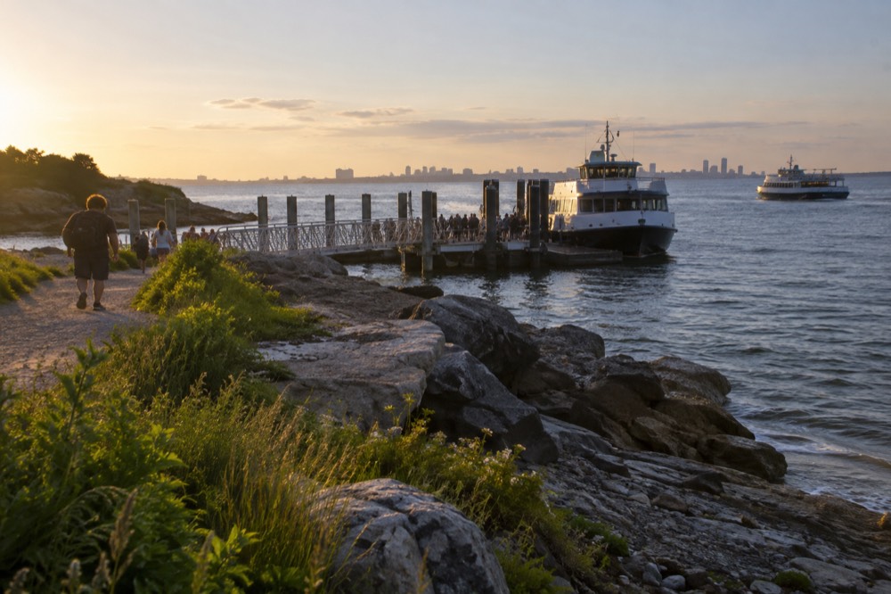 Ferry boats at a Boston Harbor island dock on a summer day