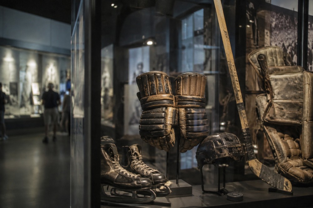 Hockey memorabilia displays inside a Boston sports museum
