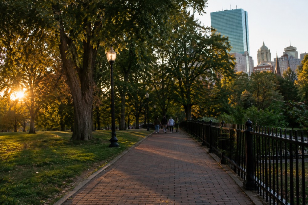 A red brick historic trail marker on a Boston street