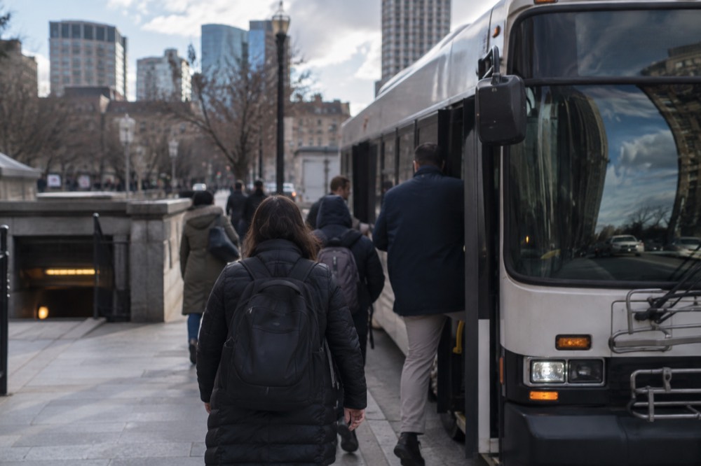 A shuttle bus replacing subway service at a closed station entrance