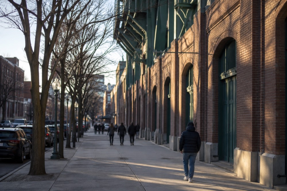 The brick exterior facade of Fenway Park on a mild spring afternoon