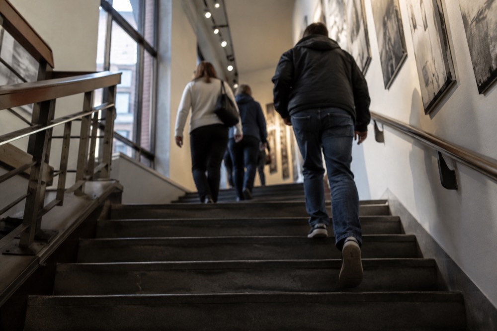 Visitors on a museum staircase near Fenway Park