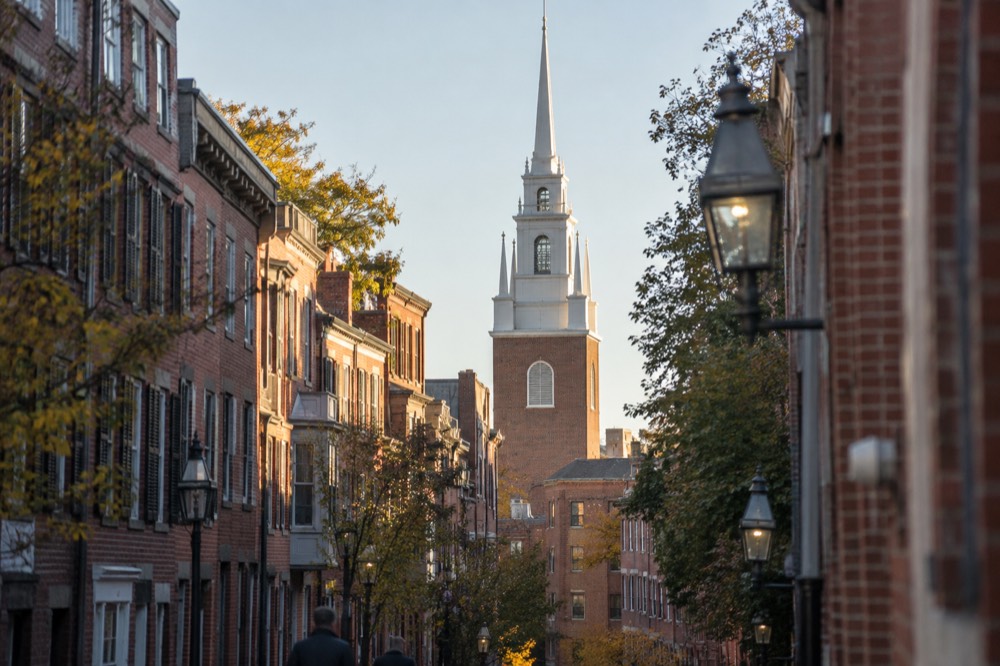 The red brick Old North Church rising above Boston's North End rooftops