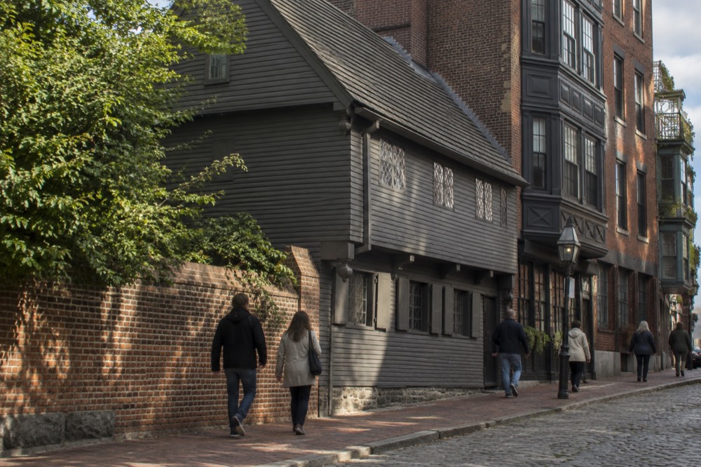 Visitors walking past the Paul Revere House in Boston's North End