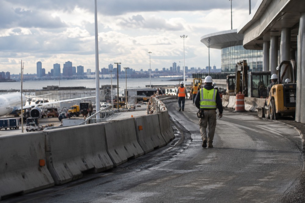 Construction crews working on a terminal roadway at Logan Airport