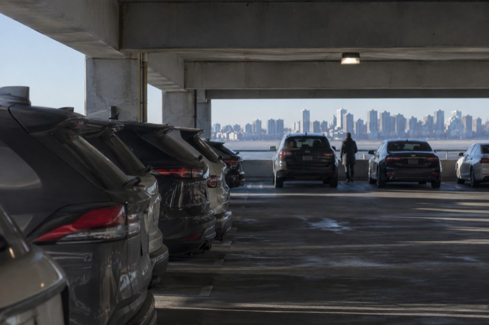 Rows of cars in an airport parking garage at Logan