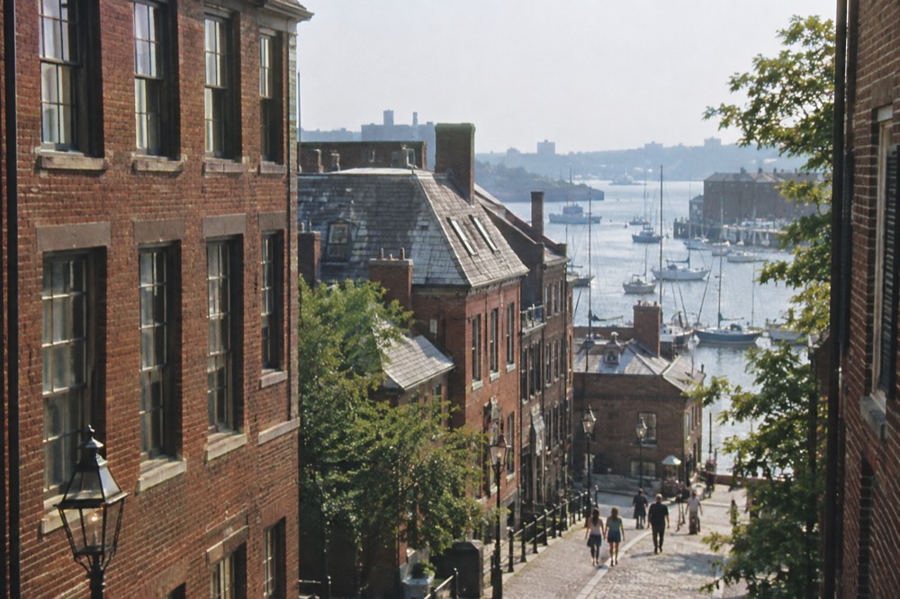 Historic brick commercial buildings and narrow streets in downtown Boston near the harbor