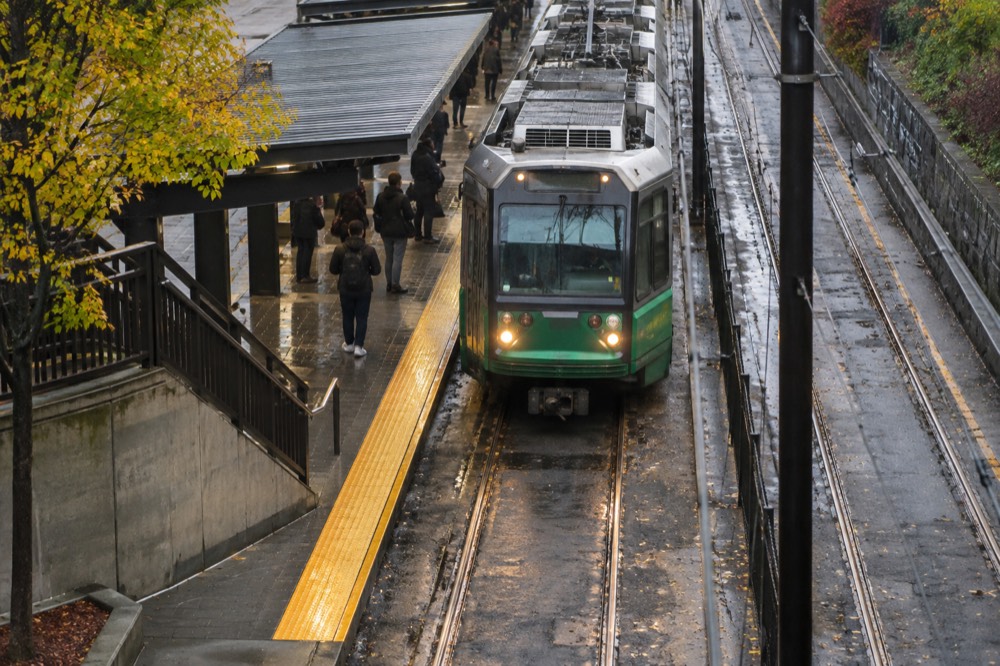 A Green Line trolley arriving at a downtown Boston subway platform