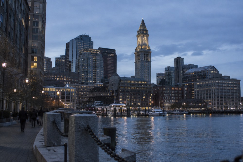 The Custom House tower rising above downtown Boston rooftops near the waterfront